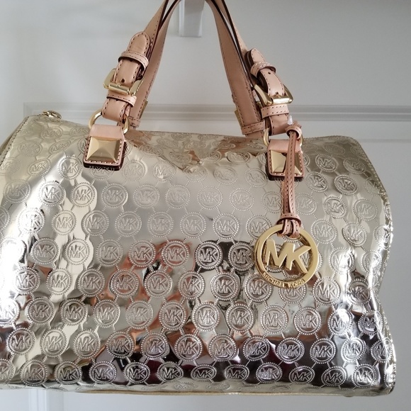 Michael Kors Handbags - Brand new Michael Kors Gold Bag,size M